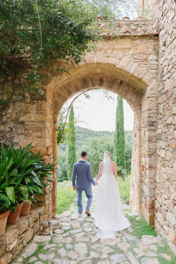 Bride and groom at Castello di Vicarello wedding photographer tuscany